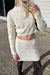 Knit top and mini skirt set in ivory — main image