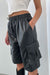Vegan leather cargo short in black — main image
