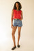 Cut off denim shorts in dark wash — main image