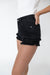 Ruffle denim short in black — main image