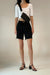 High waisted black denim short in black — main image