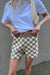 Checkered knit short in evergreen check — image