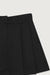 Woven pleated tennis skirt in black — main image