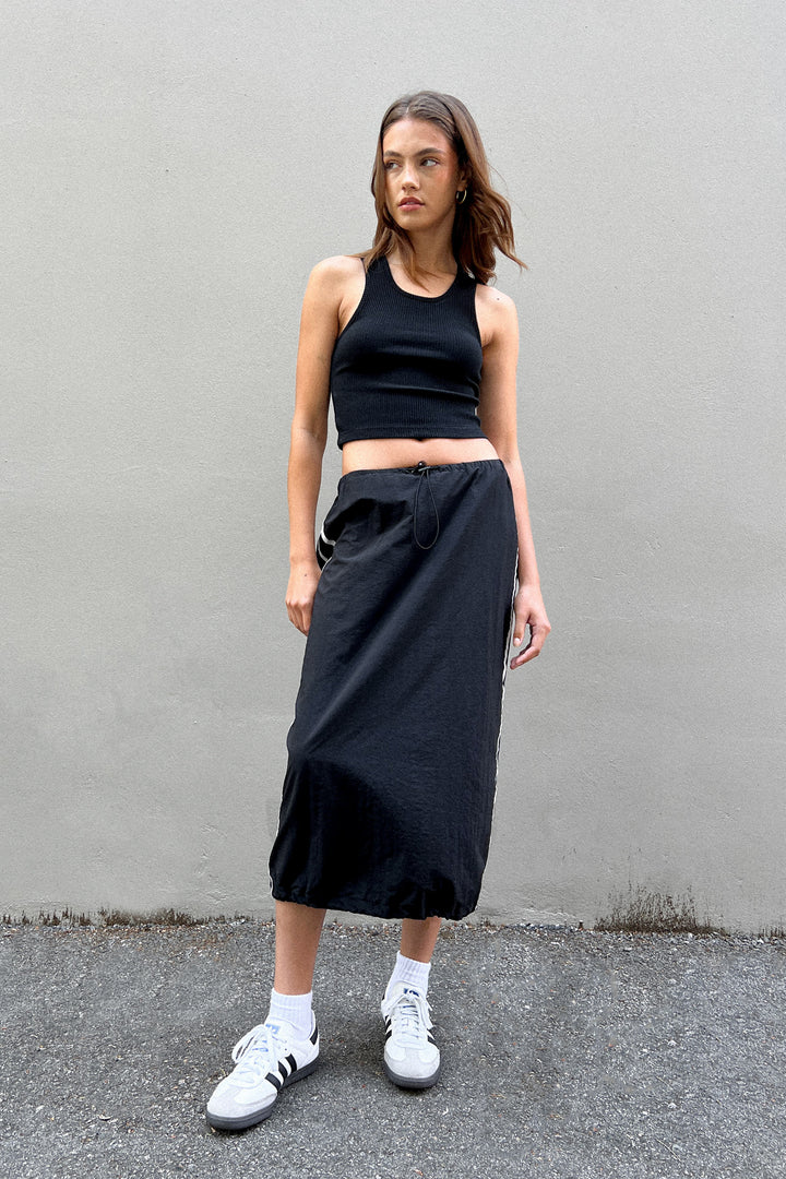 MIDI SKIRT WITH SIDE PIPING in Black — alternate angle