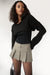 Cotton twill pleated mini skirt in mulled basil — main image