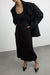 Ribbed midi skirt in black — main image