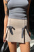 Mini skirt with ribbons in beige — main image
