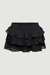 Ruffled tiered chiffon mini skort in black — main image