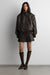 Vegan leather pleated mini skort in vintage brown — main image