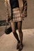 Pleated plaid mini skirt in brown plaid — main image