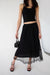 Sheer lace tiered maxi skirt in black — main image