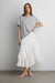 Asymmetrical tiered maxi skirt in white — main image