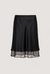 Layered sheer hem slip skirt in black — main image