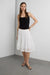 Sheer polka dot midi skirt with ruffled hem detail in white — main image