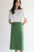 Polka dot cotton linen skirt in green — main image