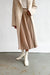 Midi pleated skirt in cream — main image
