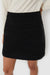 Tweed mini skirt in black — main image