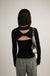 Open back mockneck sweater in black — main image