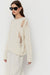 Distressed oversized sweater in cream — main image