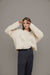 Patterned knit sweater in beige — main image