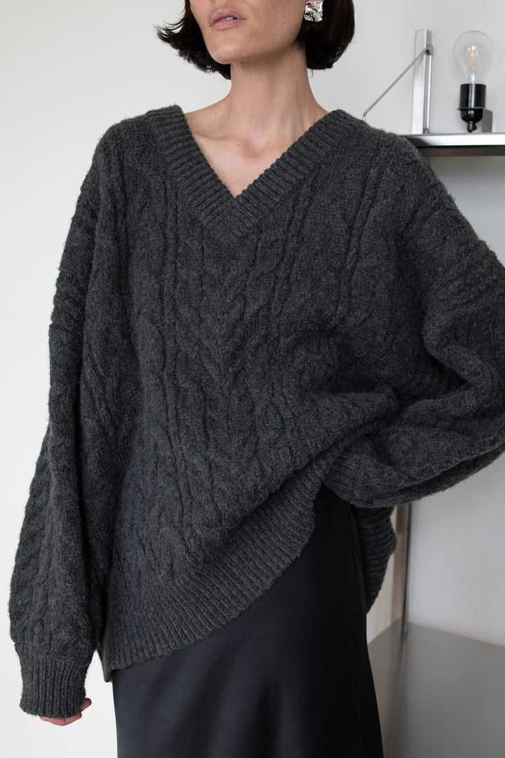 CABLE KNIT V-NECK SWEATER in Asphalt — alternate angle