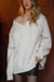 Cable knit v-neck sweater in oatmeal — main image