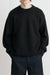 Textured crewneck sweater in black — main image