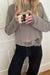 Oversized distressed sweater in abbey stone — main image