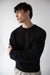 Crewneck open knit sweater in black — main image