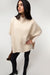 Turtleneck cape in fog — main image