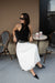 Sleeveless halter neck tank top in black — main image