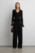 Rib-knit ruffled button front cardigan in black — main image