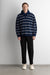Striped long sleeve polo sweater in navy blue stripe — main image