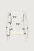 Bow pattern sweater in ivory — main image
