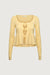 Ribbed tie front peplum sweater in soft yellow — main image