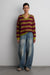 Wool blend striped v-neck sweater in olive — main image