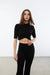 Cropped mockneck sweater in black — main image