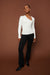 Cut-out neck long sleeve top in cream — main image