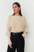 Cropped ribbed sweater in beige — main image