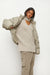 Oversized turtleneck sweater in heather beige — main image