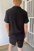Ribbed polo t-shirt in black — main image