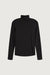 Turtleneck knit top in black — main image