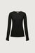 Sheer crewneck long sleeve top in black — main image