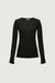 Sheer crewneck long sleeve top in black — main image