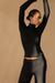 Turtleneck long sleeve top in black — main image
