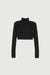 Cropped turtleneck top in black — main image