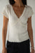 Short sleeve top with lace v-neckline in cream — main image
