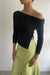 Off the shoulder knit top in black — main image