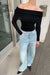 Long sleeve off the shoulder top in black — main image