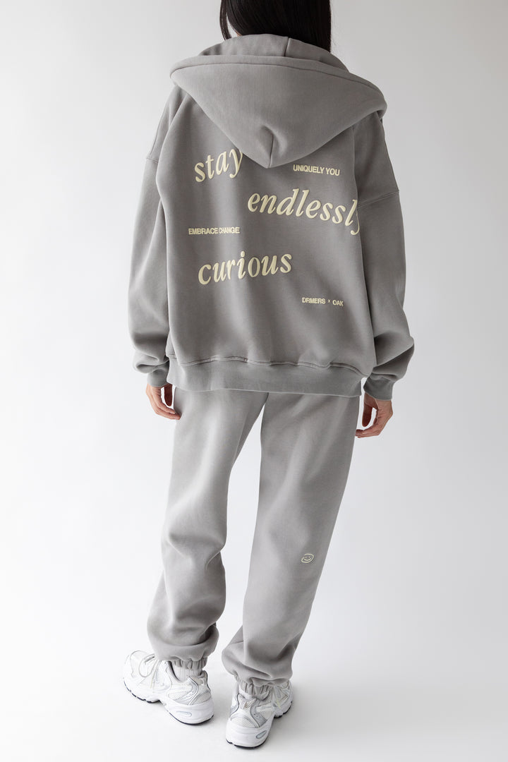 DRMERS X OAK ENDLESSLY CURIOUS ZIP-UP HOODIE in Stone Grey — alternate angle